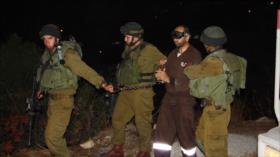 Colonos y soldados israelíes golpean hasta desmayar a un joven cristiano en Al-Quds