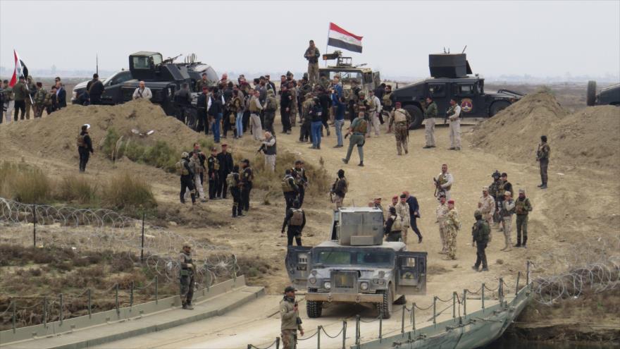 Concentración de fuerzas iraquíes tras recuperar una zona cerca de Ramadi.