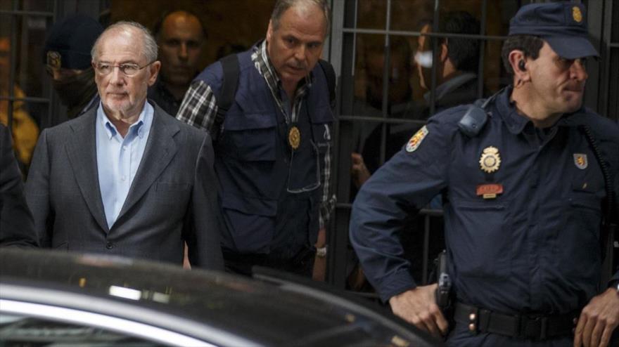 El exvicepresidente español Rodrigo Rato (izda.).