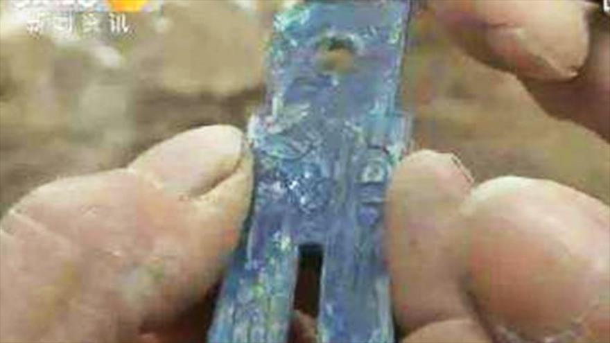 Una de las monedas de la dinastía Qin encontrada en la provincia de Shaanxi.