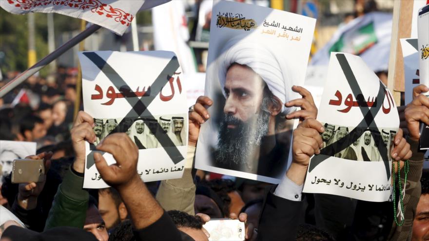 Manifestantes iraquíes en Bagdad condenan la ejecución del prominente clérigo chií, sheij Baqer Nimr al-Nimr por el régimen de Al Saud.