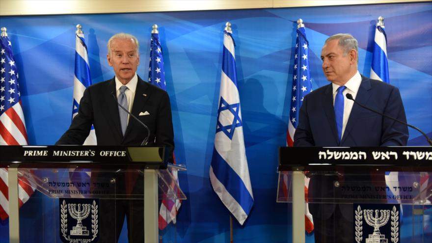 El vicepresidente de EE.UU., Joe Biden (izda.), y el primer ministro del régimen de Israel, Benyamin Netanyahu, ofecen una rueda de prensa conjunta en los territorios ocupados palestinos, 9 de marzo de 2016.