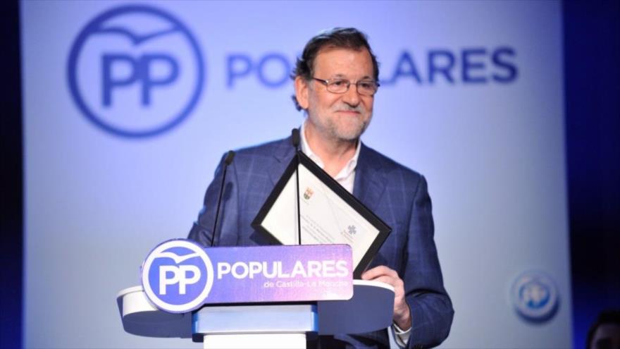 El presidente del Gobierno en funciones de España, Mariano Rajoy, durante su intervención en la clausura de acto de Nuevas Generaciones celebrado en Toledo, 19 de marzo de 2016.