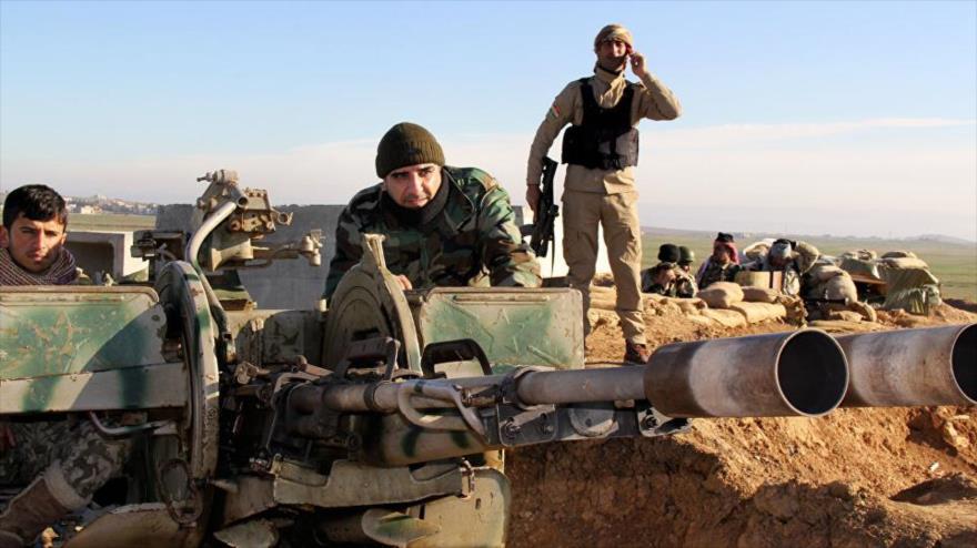 Los combatientes kurdos (Peshmerga).