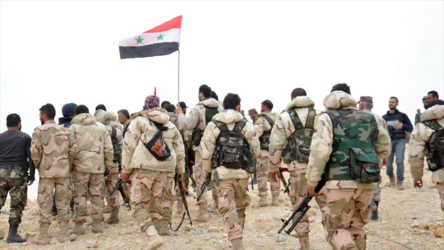 Las fuerzas del Ejército sirio entran en la ciudad histórica de Palmira después de combates intensos con el grupo terrorista takfirí EIIL (Daesh, en árabe), 27 de marzo de 2016.
