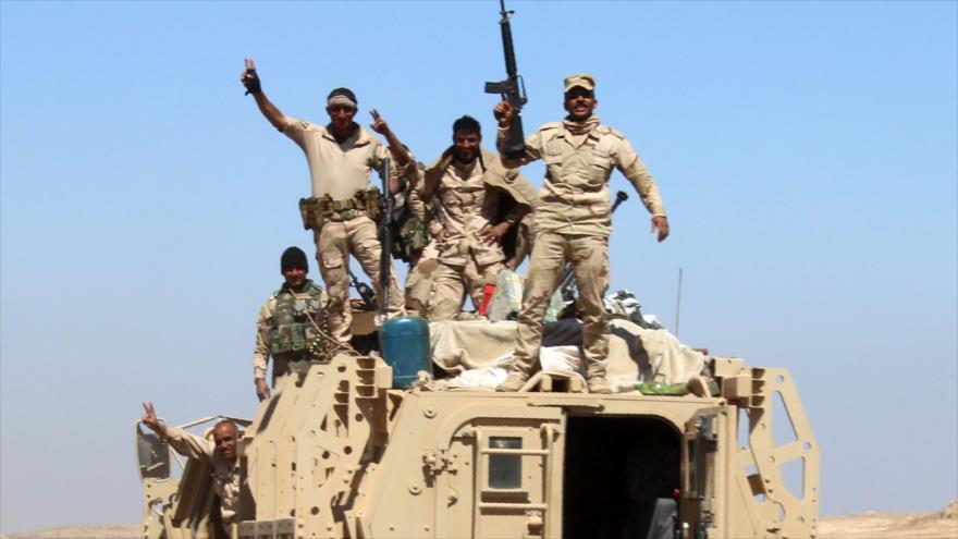 Fuerzas iraquíes celebran sus logros en la provincia occidental de Al-Anbar, 2 de abril de 2016.