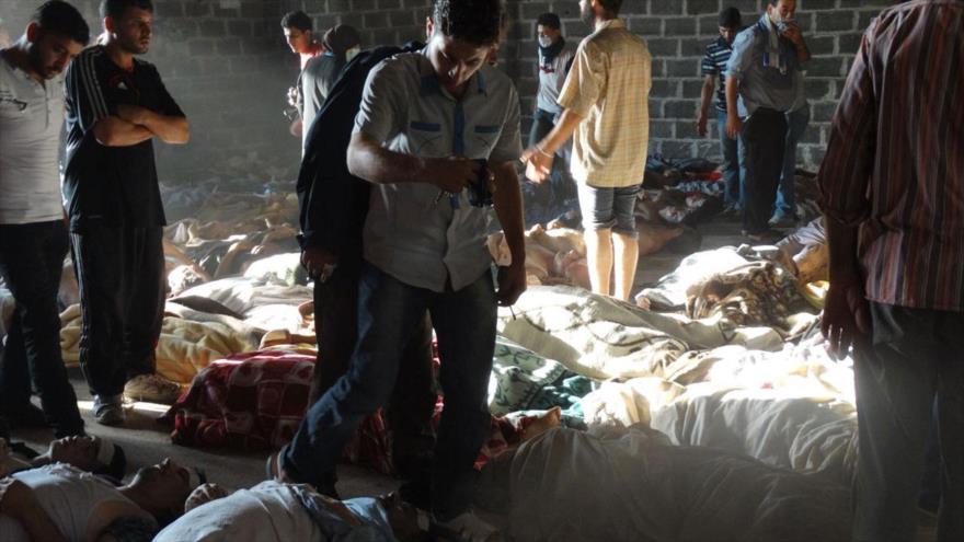 Víctimas de un ataque químico perpetrado en Guta en los suburbios de la ciudad capitalina de Damasco, agosto de 2013.