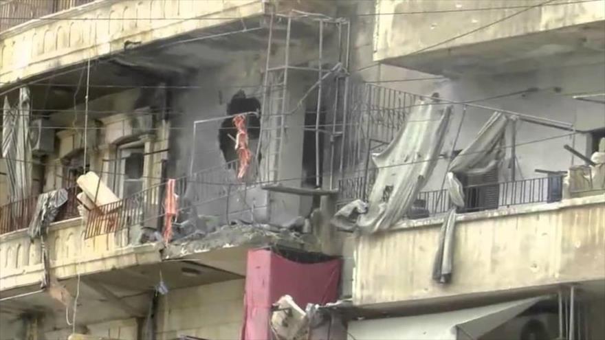 Edificios en ruinas del barrio Sheij Maqsud, situado en la ciudad de Alepo, norte de Siria.