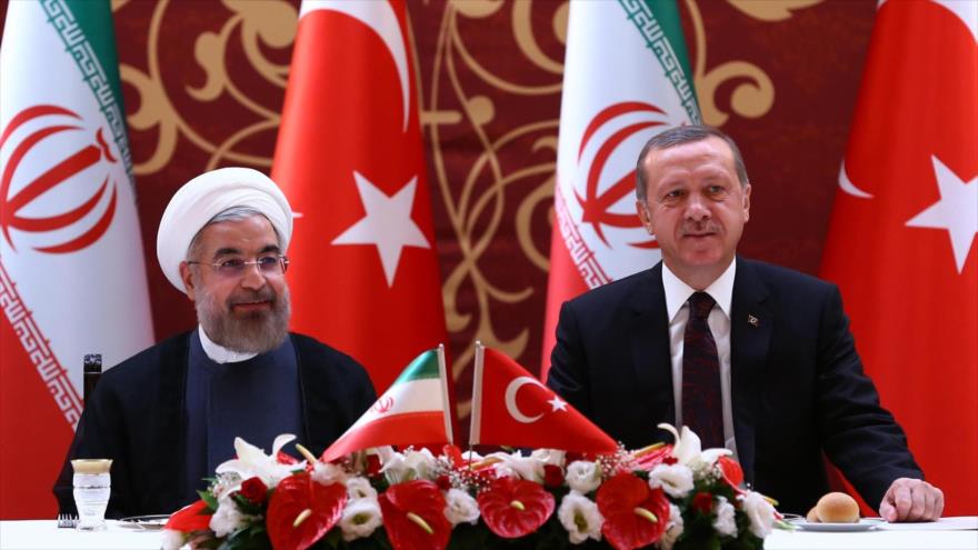 Los presidentes de Irán y Turquía, Hasan Rohani (izda.) y Recep Tayyip Erdogan, respectivamente.