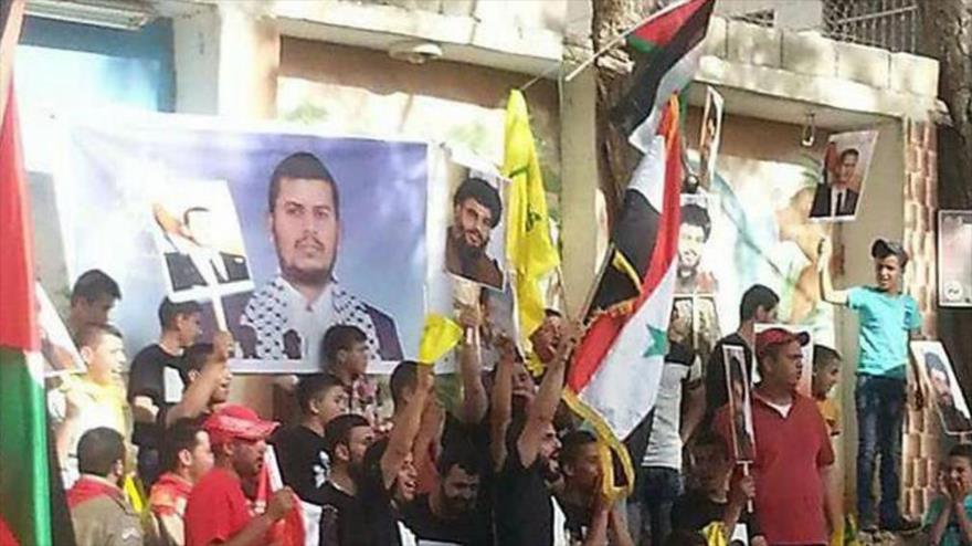 Los palestinos y drusos marchan en apoyo a Hezbolá y la resistencia en la región, en la ciudad cisjordana de Ramalá, 17 de abril de 2016.