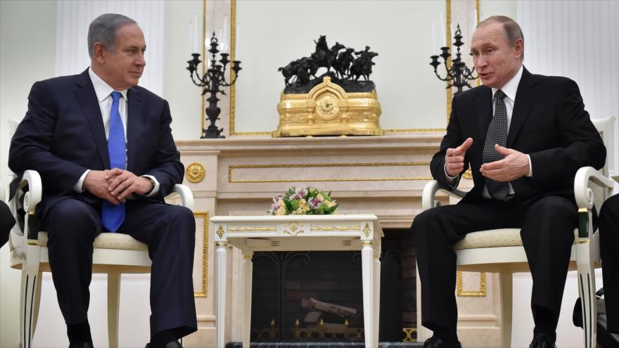 El primer ministro israelí, Benyamin Netanyahu (izqa), el presidente ruso, Vladimir Putin.