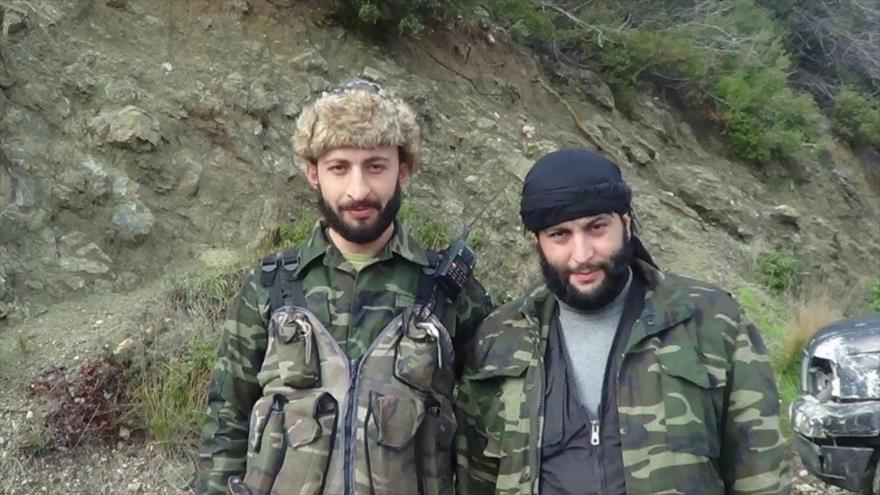 Alparslan Celik (izqda.), quien reivindicó la muerte de un piloto militar ruso en noviembre de 2015.
