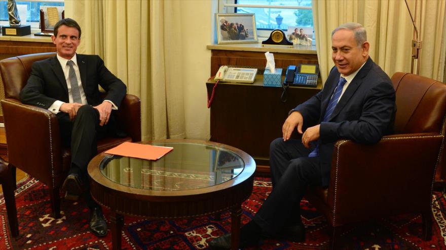 El primer ministro del régimen de Israel, Benyamin Netanyahu (dcha.) se reúne con el premier francés, Manuel Valls, 23 de mayo de 2016.