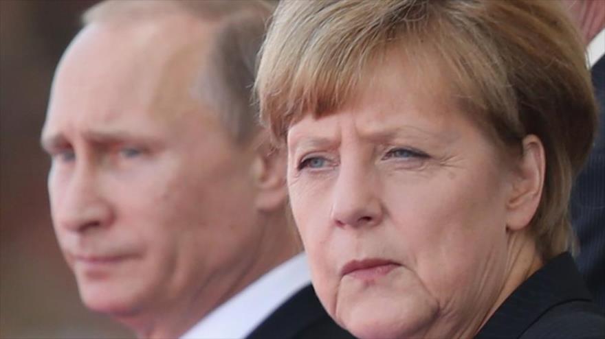 El presidente ruso, Vladimir Putin, y la canciller alemana, Angela Merkel.