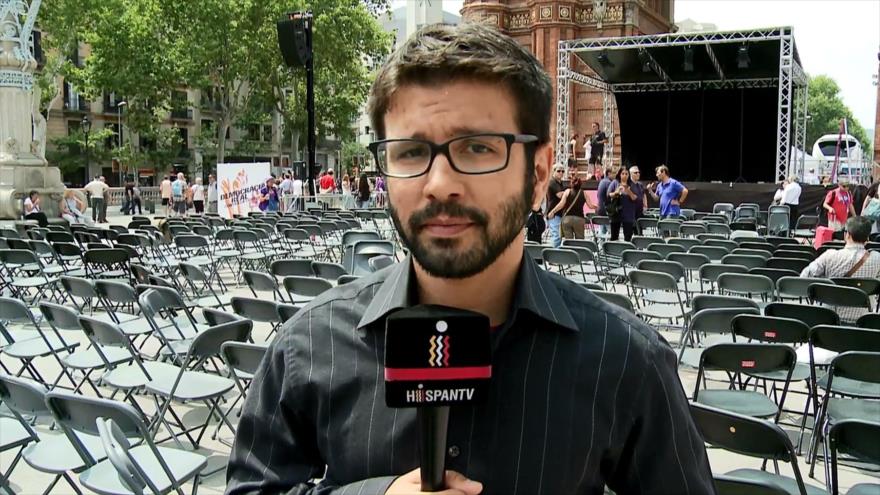 Iglesias y Garzón defienden la unidad para ganar al PP en un mitin multitudinario