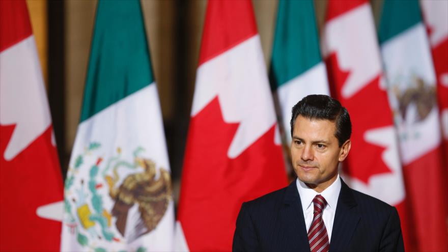 El presidente de México, Enrique Peña Nieto, habla con los medios en su visita oficial a Canadá, 28 de junio de 2016.
