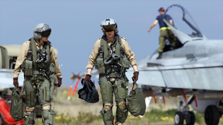Dos pilotos canadienses.