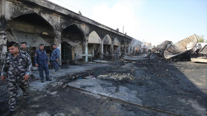 Un ataque suicidia reduce a cenizas el mercado adyacente del mausoleo del Seyed Mohamad bin Ali al-Hadi en Balad, cerca de Bagdad, capital de Irak. 8 de julio de 2016