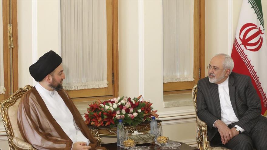 El ministro iraní de Asuntos Exteriores, Mohamad Yavad Zarif (dcha.), se reúne con el presidente de la Asamblea Suprema Islámica de Irak, Seyed Amar al-Hakim, en Teherán, capital persa, 10 de julio de 2016.