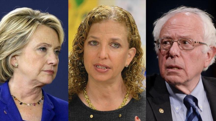 La virtual candidata demócrata a las presidenciales de EE.UU., Hillary Clinton (izda.), el senador por el estado de Vermont, Berni Sanders (dcha.), y la presidenta del Partido Demócrata, Debbie Wasserman Shultz (centro).