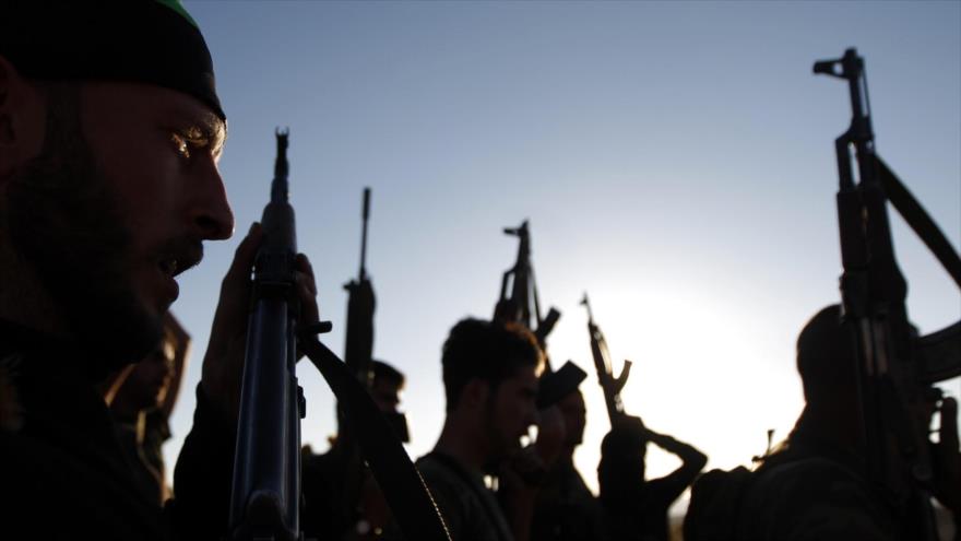 Miembros de un grupo armado que lucha contra el Gobierno sirio. 