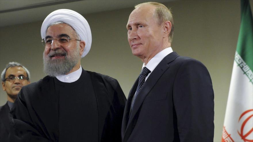 El presidente iraní, Hasan Rohani, con su par ruso, Vladimir Putin.