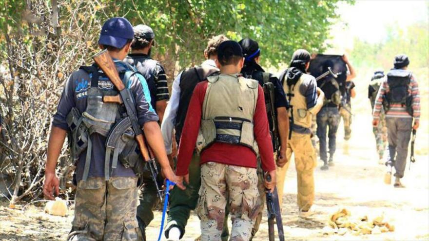 Integrantes de Yeish al-Islam preparándose para participar en las ofensivas antigubernamentales, 7 de agosto de 2016.