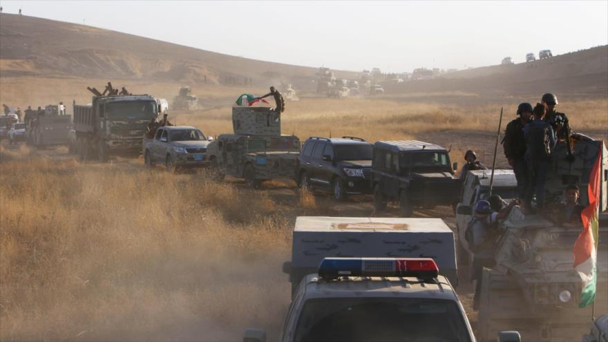 Vehículos de las fuerzas kurdas iraquíes en la provincia de Nínive (norte iraquí) tras la recuperación de nueve pueblos en la zona, 14 de agosto de 2016.