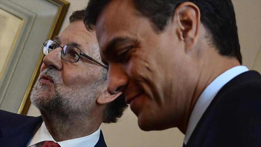 El líder del Partido Popular (PP), Mariano Rajoy (izda.) y el secretario general del Partido Socialista Obrero Español (PSOE), Pedro Sánchez.