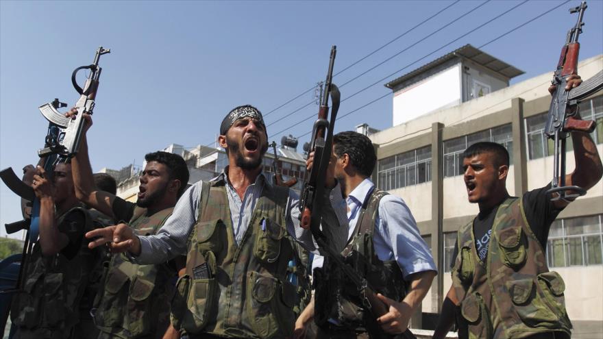 Integrantes de un grupo armado apoyado por EE.UU. que luchan contra el Gobierno sirio.