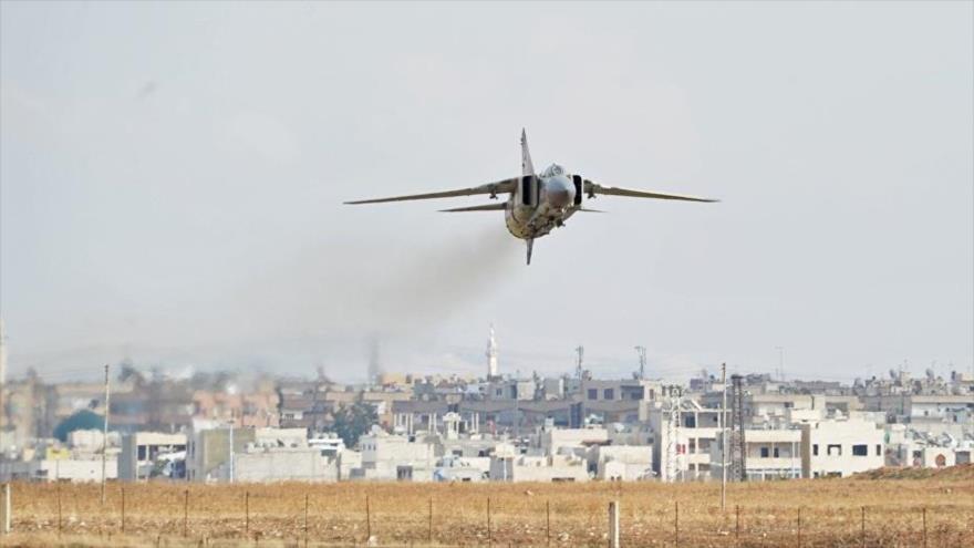 Un avión de combate modelo MiG-23 de la Fuerza Aérea de Siria.