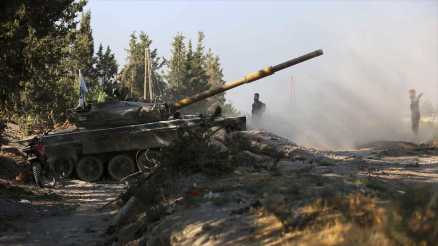 Integrantes del grupo Yeish al-Islam durante combates con las fuerzas sirias en un pueblo en las cercanías de Damasco, 1 de septiembre de 2016. 