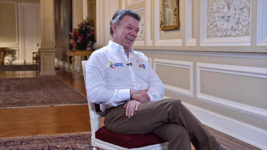 El presidente colombiano, Juan Manuel Santos, sonrie durante una entrevista con AFP, en el palacio presidencial de Casa de Narino, en Bogotá, capital de Colombia, 5 de septiembre de 2016