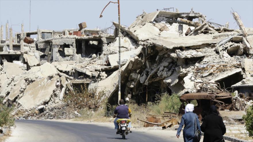 Edificios de un barrio sirio en la ciudad central de Homs devastado por el conflicto sirio.