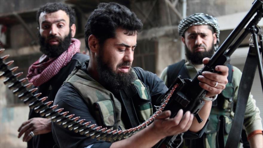 Integrantes de grupos armados en Siria.
