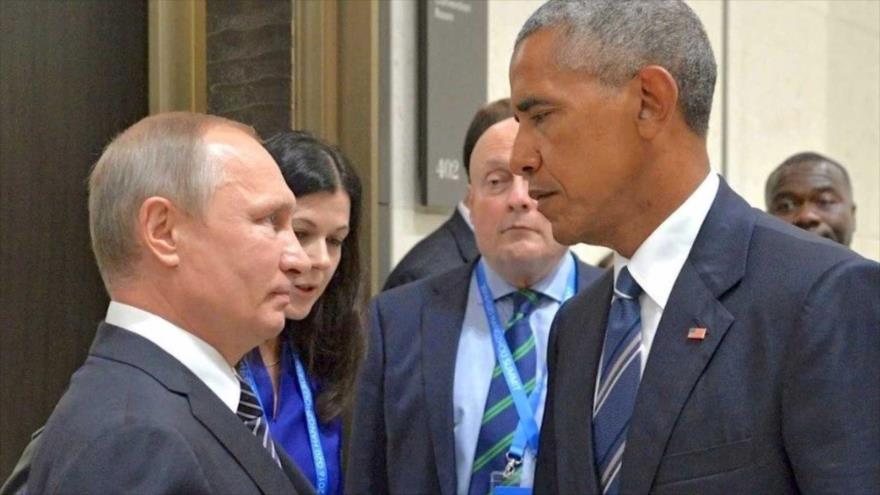 El presidente ruso, Vladimir Putin (izda.), y su homólogo estadounidense, Barack Obama, conversan durante una reunión celebrada en los márgenes de la Cumbre del Grupo de los 20 (G-20) en China, 5 de septiembre de 2016.