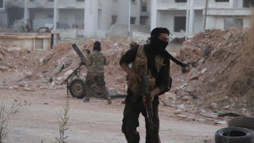 Miembros de grupos terroristas en una ofensvia en Alepo.