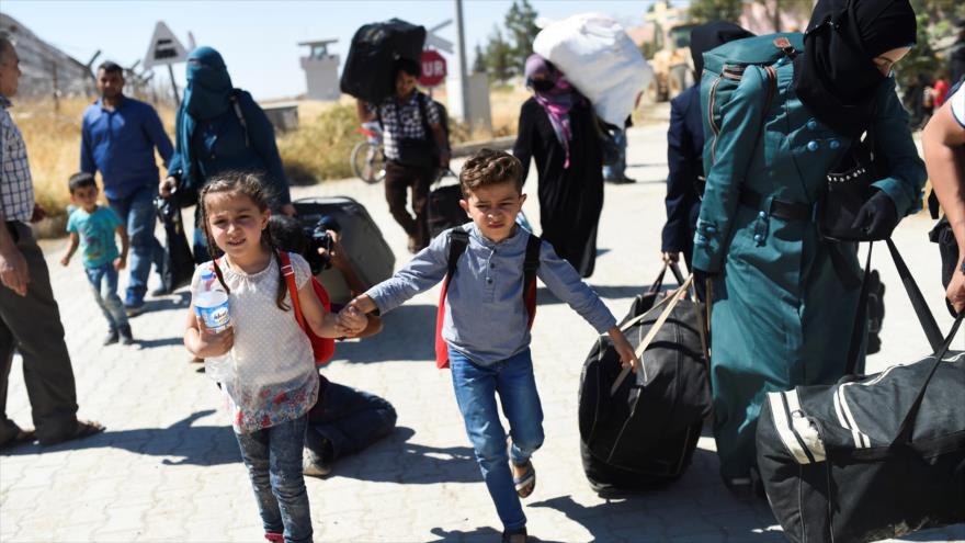Refugiados sirios en el camino de regreso a sus hogares en Yarabulus, 7 de septiembre de 2016.