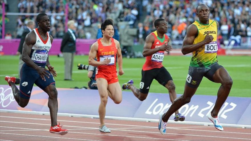 El atleta jamaicano Usain Bolt (primero) en los JJOO de Río.
