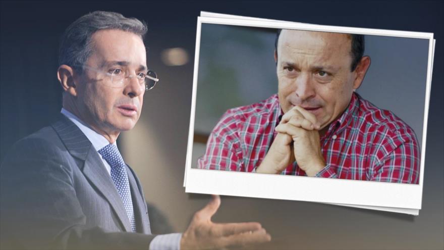 El expresidente de Colombia Álvaro Uribe Vélez (izda.) y su hermano Santiago Uribe, acusado de cometer homicidios.