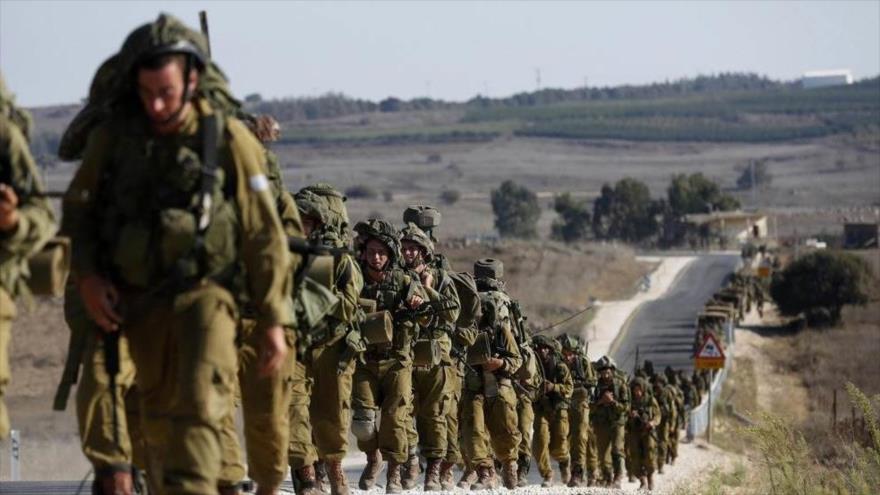 Fuerzas israelíes en los ocupados altos sirios de Golán.