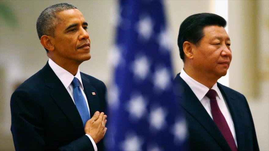 El presidente de EE.UU., Barack Obama (izda.), y su par chino, Xi Jinping, encabezan un encuentro bilateral en Pekín, capital china, 12 de noviembre de 2014.
