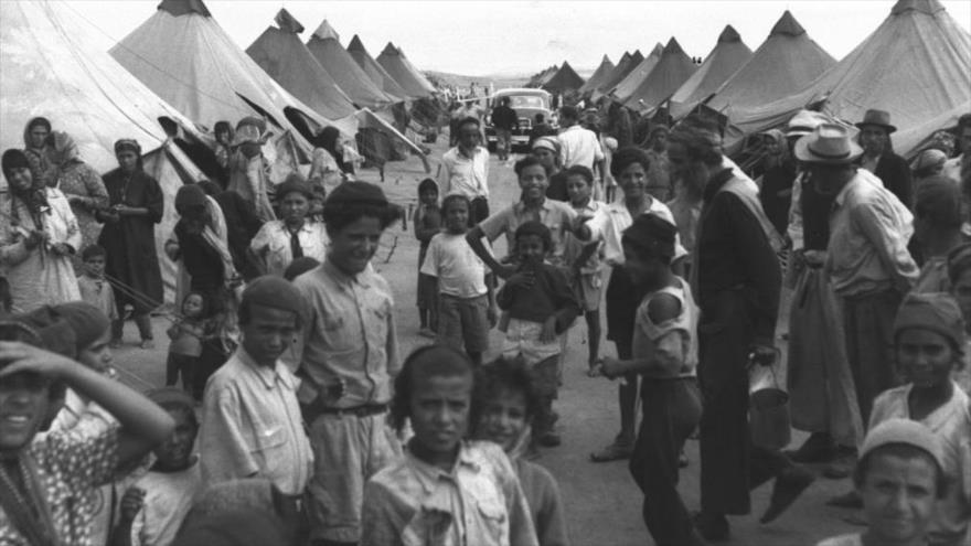 Niños yemeníes en un campamento del régimen israelí, en 1950.