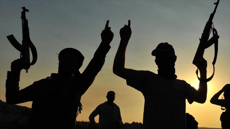 Miembros del grupo terrorista takfirí EIIL (Daesh, en árabe) en el territorio sirio.