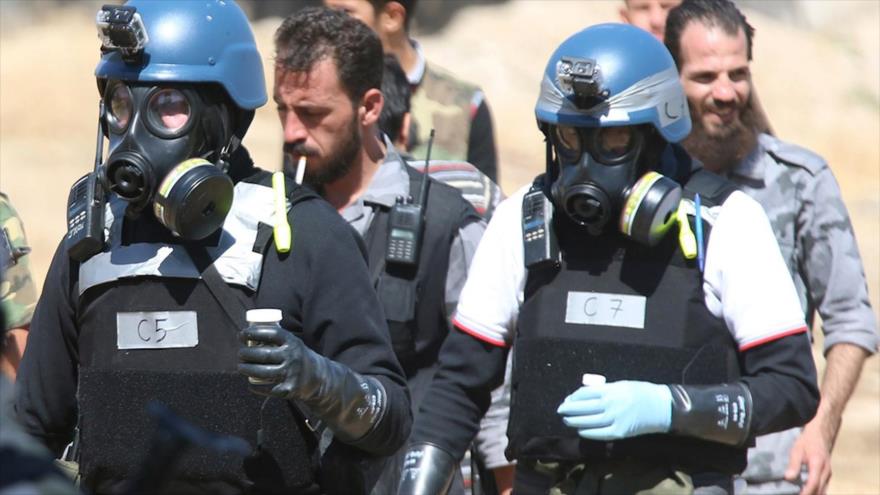 Expertos en armas químicos de la OPAQ en Ain Tarma, un suburbio de Damasco, capital siria, agosto de 2013.