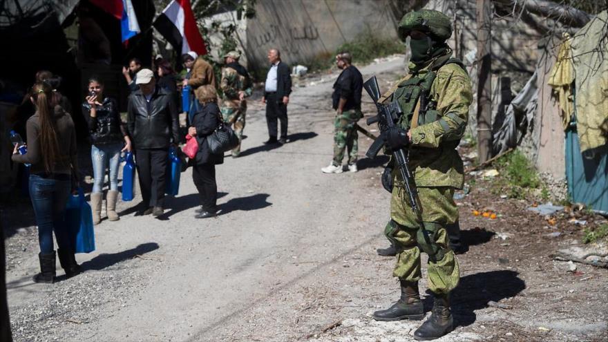 La fuerza especial rusa desplegada en uno de los pueblos sirios cerca de la frontera con Turquía.