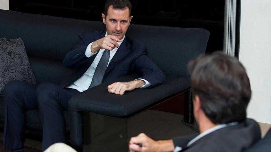 El presidente sirio, Bashar al-Asad, concede una entrevista al periodista francés, Georges Malbrunot.