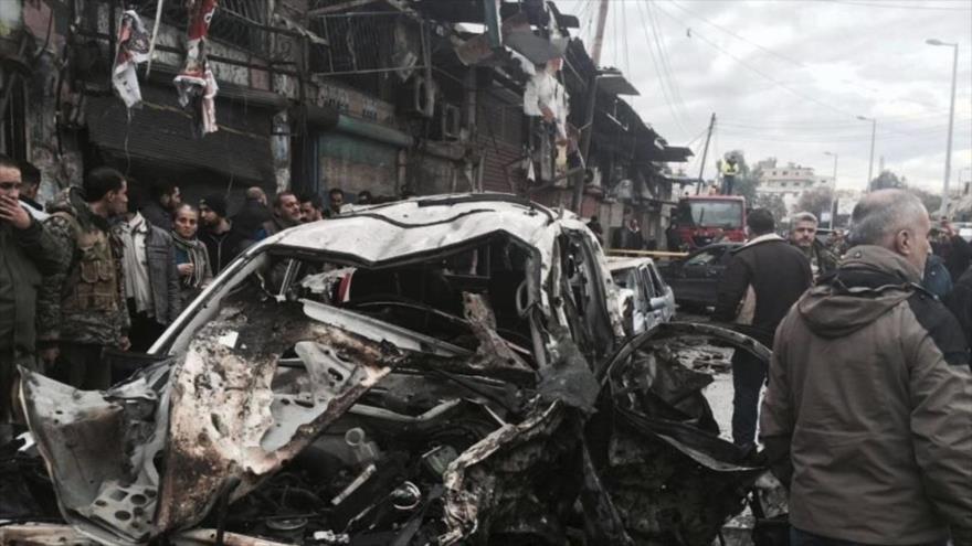 El lugar donde ha sucedido un atentado con coche bomba en Siria.