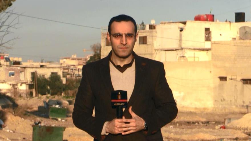 Civiles vuelven a sus hogares en el campo de Damasco