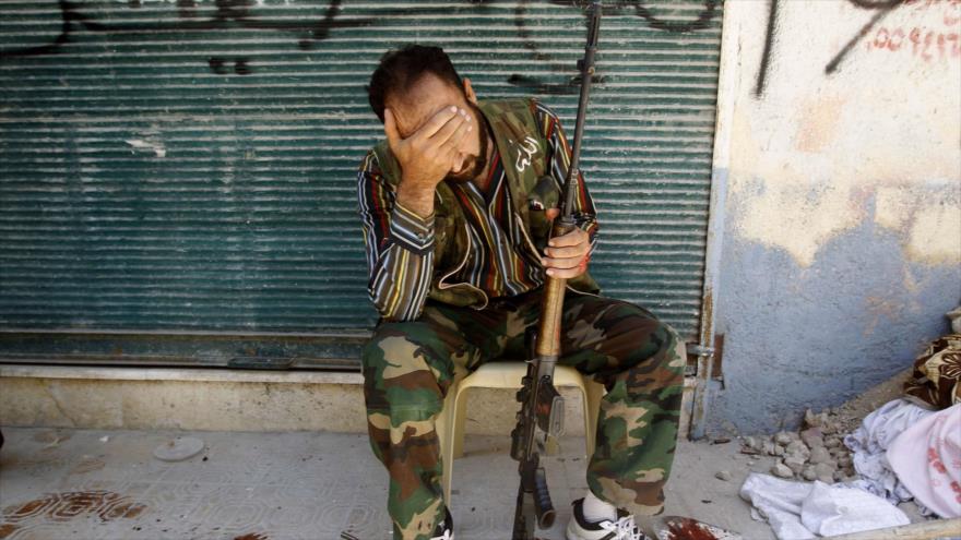 Combatiente del llamado Ejército Libre Sirio (ELS) en el barrio Salah al-Din, en el centro de Alepo, 25 de enero de 2015.